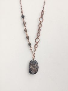 Copper beaded necklace with stone pendant