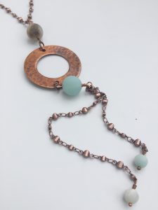 Copper necklace with gemstone beads and pendant.