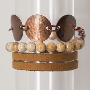 Brown leather, copper, stone bead bracelets stacked