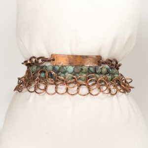 Vintage copper and turquoise bracelet with chain links.