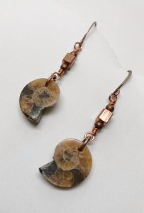 Fossil shell earrings with copper accents