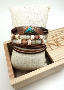 Bohemian style bracelet with turquoise triangle detail.
